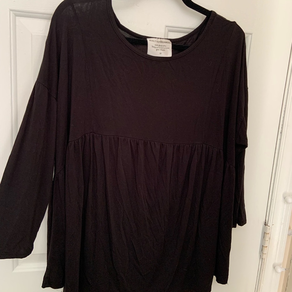 Oversized blouse with waist detail. 3/4 sleeve